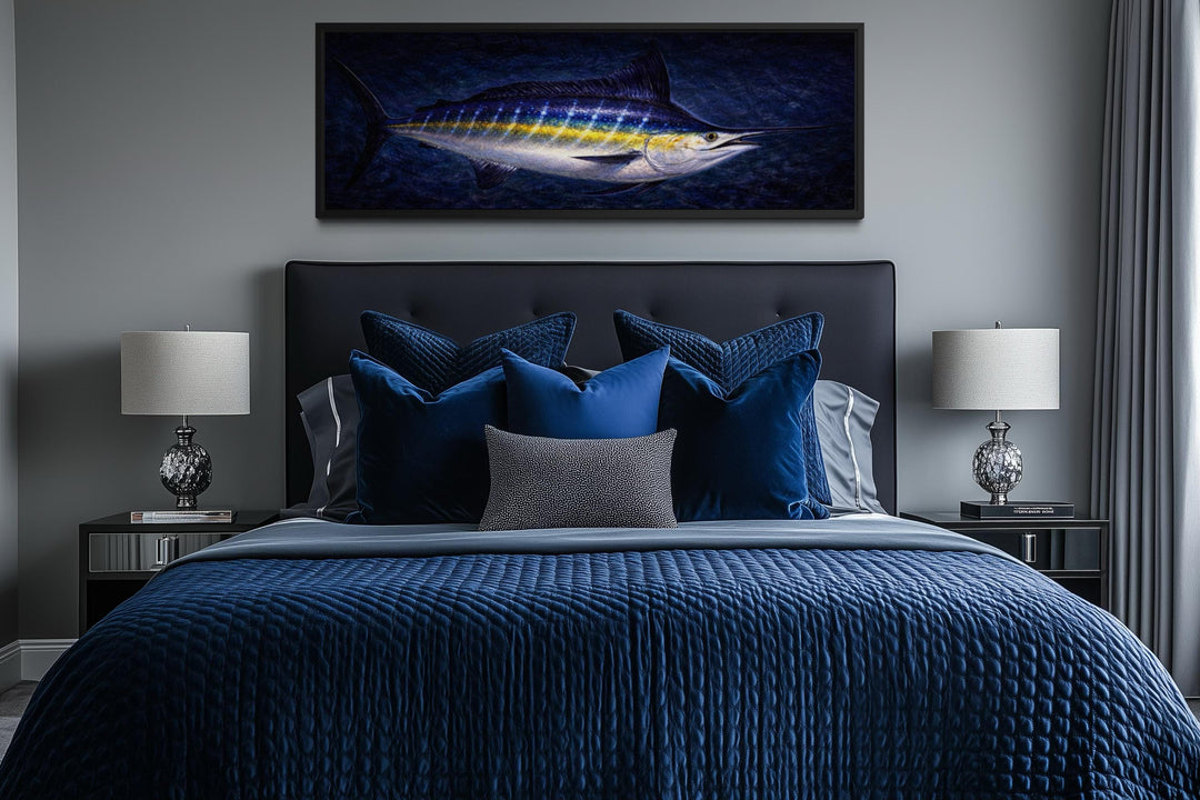 Long horizontal blue marlin canvas wall art displayed above a bed in a modern nautical bedroom.