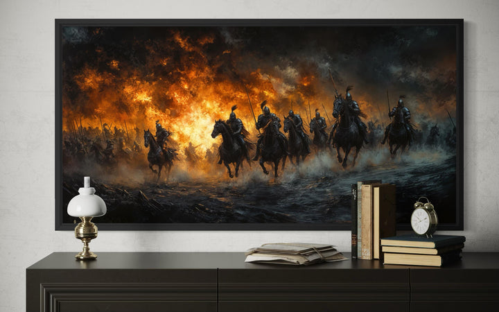 A panoramic canvas of medieval knights charging through fire and smoke on a dark battlefield.