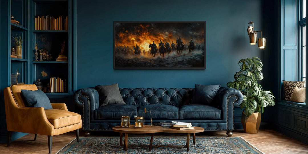 A panoramic canvas of medieval knights charging through fire hangs in a dark blue, modern study.