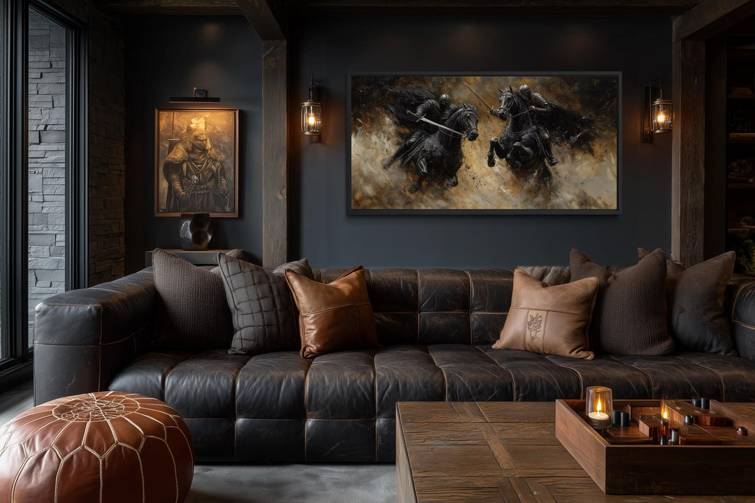 Horizontal framed canvas painting of two medieval knights in a dramatic duel on horseback.