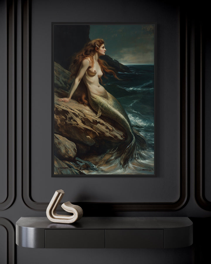 Gothic framed canvas wall art of a mermaid sitting on a rock.