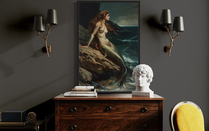 Mermaid sitting on a rock gothic framed canvas wall art.