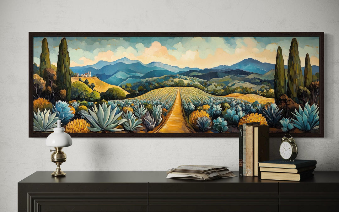 Panoramic canvas wall art of a Mexican agave field with golden paths and blue mountains.