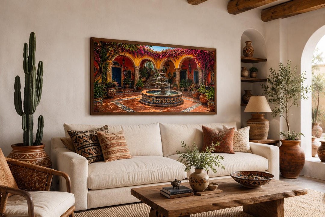 Mexican Courtyard Fountain canvas wall art above a cream sofa in a Southwest style living room.