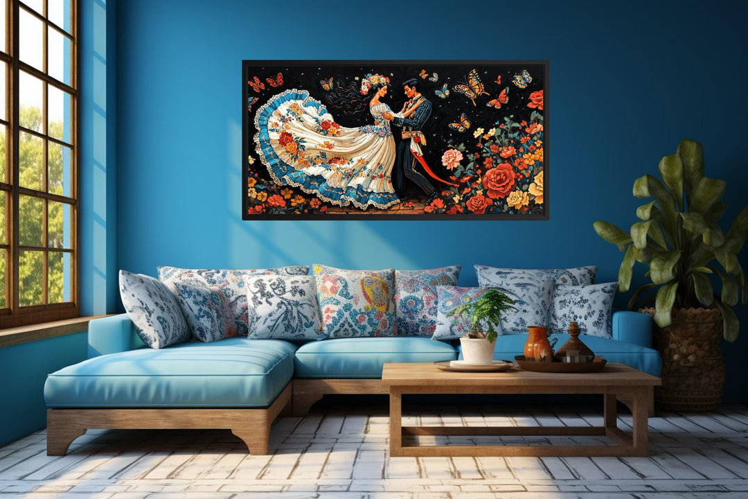 Mexican Folkloric Dance Couple canvas wall art displayed above a blue sofa in a bright room.