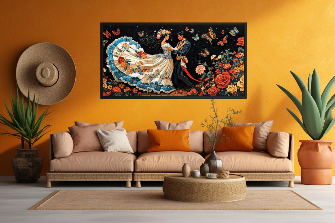 Mexican Folkloric Dance Couple canvas wall art displayed above a sofa in a vibrant orange room.