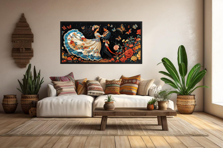 Mexican Folkloric Dance Couple canvas wall art hanging in a bohemian-style living room.