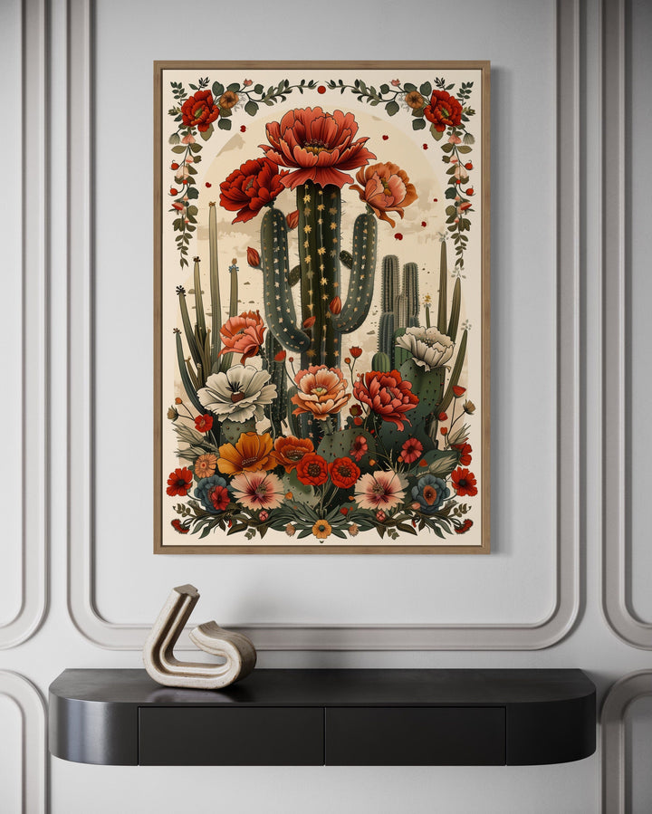 Mexican vertical cactus in bloom framed canvas wall art above a black console table.