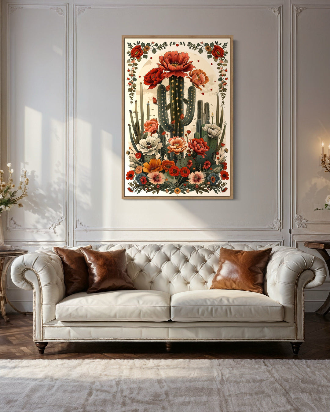 Mexican Vertical Cactus In Bloom Framed Canvas Wall Art hanging above a white tufted sofa.