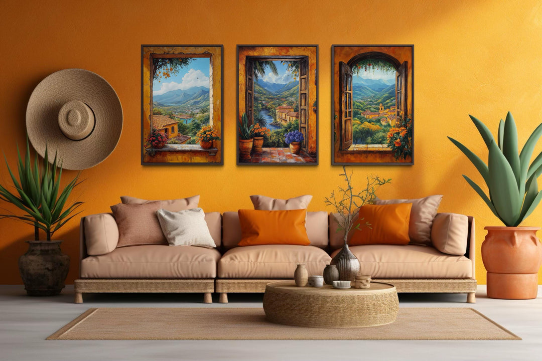 Set of three Mexican window view canvas prints featuring hacienda landscapes on an orange wall.