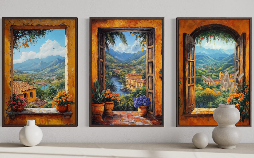 Three vertical canvas prints of Mexican hacienda window views with mountains and colorful flowers.