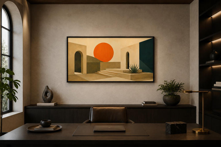 Horizontal canvas print of abstract terracotta archways and a large orange sun in a modern office.