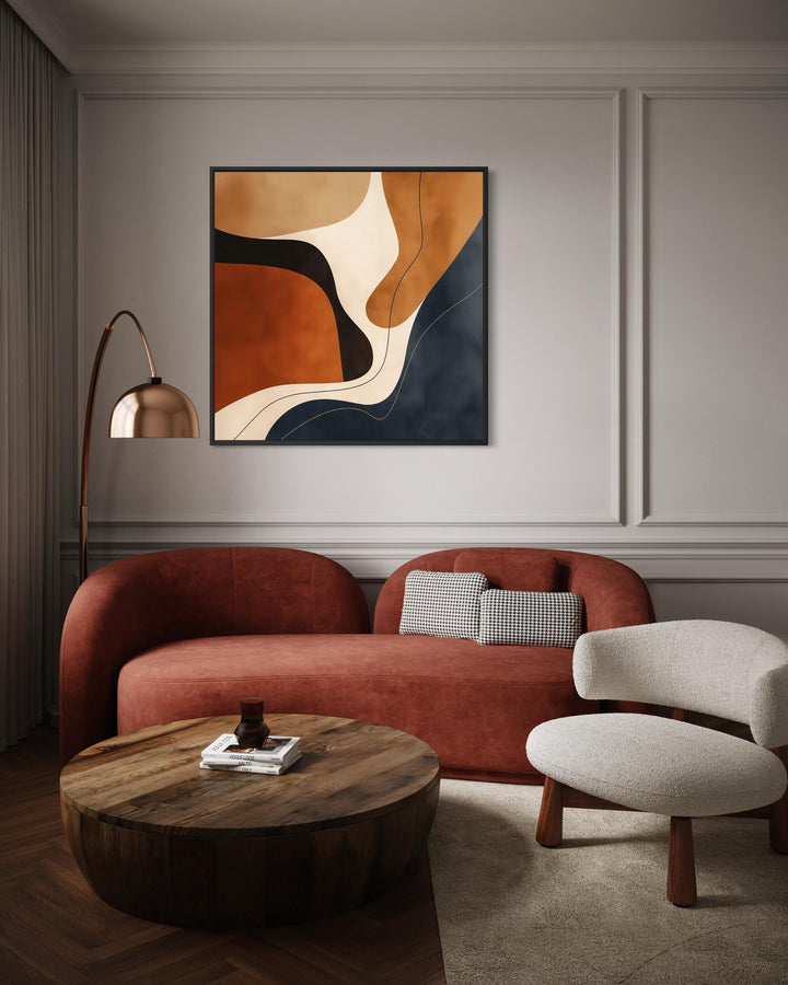 Abstract square canvas wall art featuring organic shapes in navy, rust, and beige earth tones.