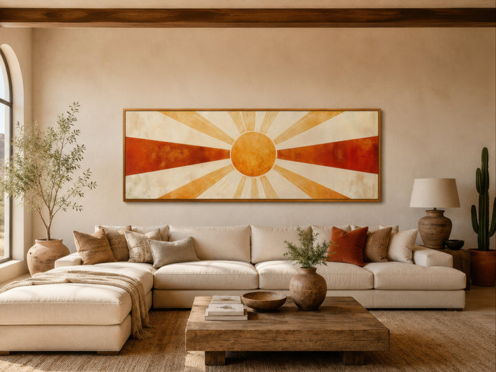 Mid century modern sun rays long horizontal wall art in a desert-inspired living room.
