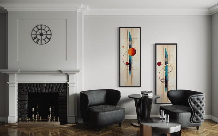 Set of two tall, narrow mid-century modern canvas prints with geometric shapes in a living room.