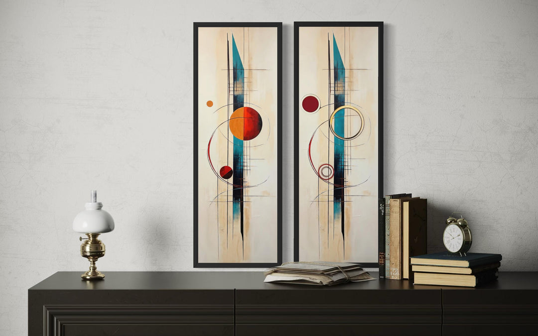 Set of 2 tall narrow canvas prints with mid-century modern geometric shapes in teal, red, and gold.