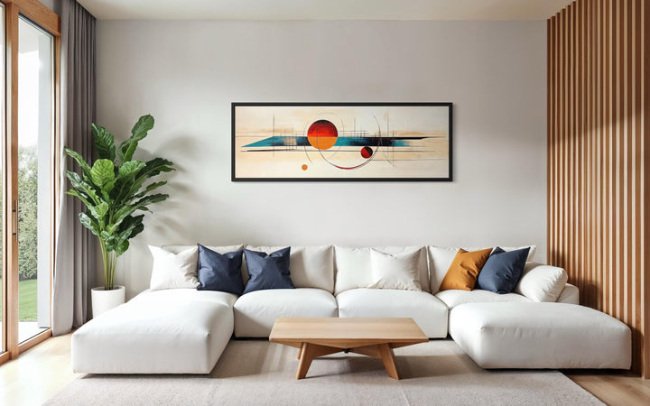 Mid century modern abstract canvas print with geometric shapes in a long horizontal frame.