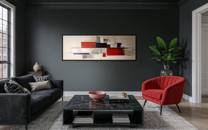 Large horizontal abstract canvas print with red, beige, and black geometric shapes on a dark wall.