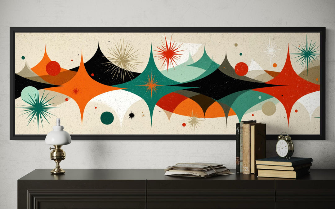Mid century modern long horizontal canvas print with a colorful atomic starburst design.