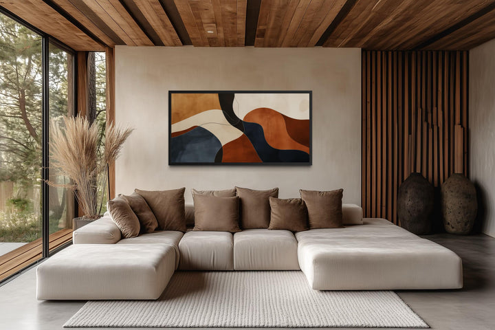 Mid Century abstract canvas print featuring earth tones in a modern living room setting.