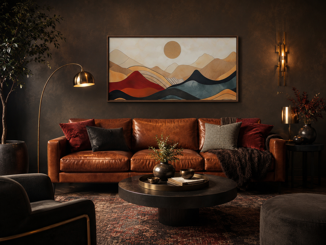 Extra large mid-century modern mountain canvas wall art above a brown leather sofa.