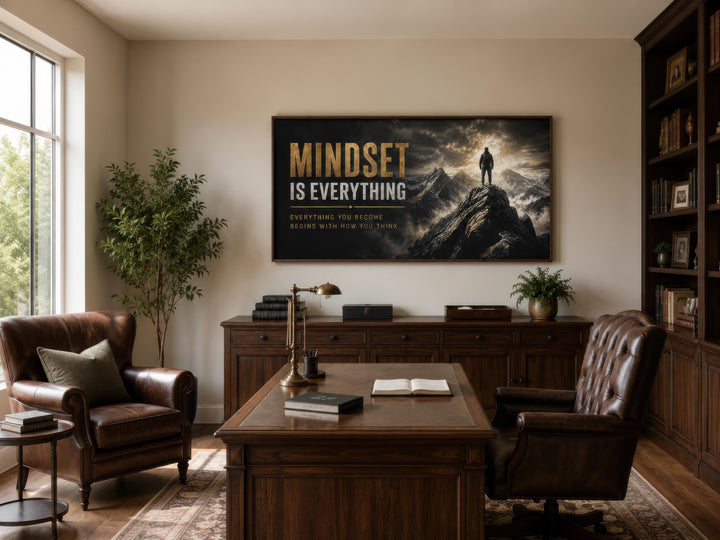 Mindset Is Everything black and gold canvas wall art in a dark wood home office above a desk.
