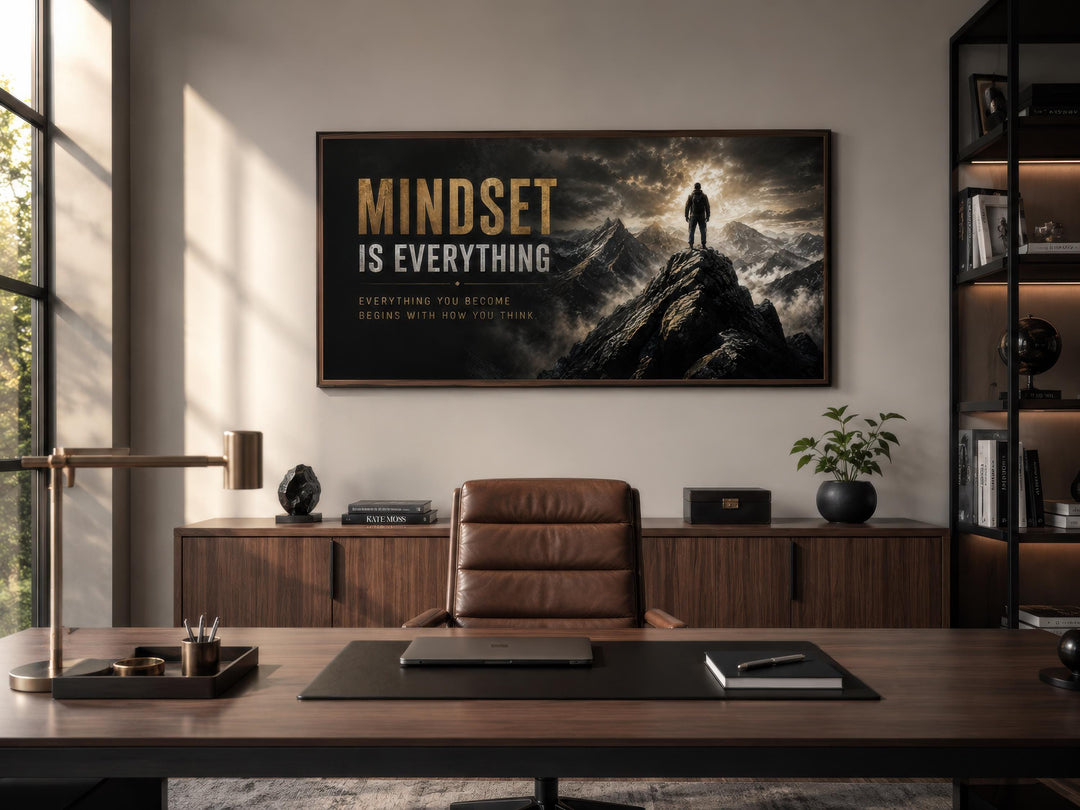 Mindset Is Everything black and gold canvas wall art above a desk in a modern office.