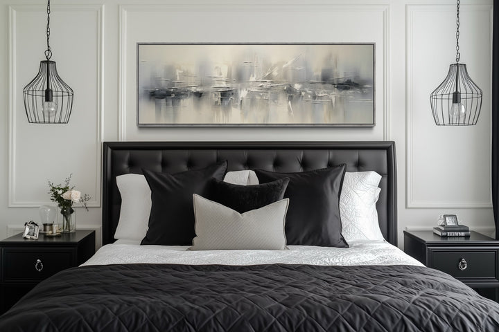 Minimalist abstract silver gray long horizontal framed canvas wall art hanging above a bed.