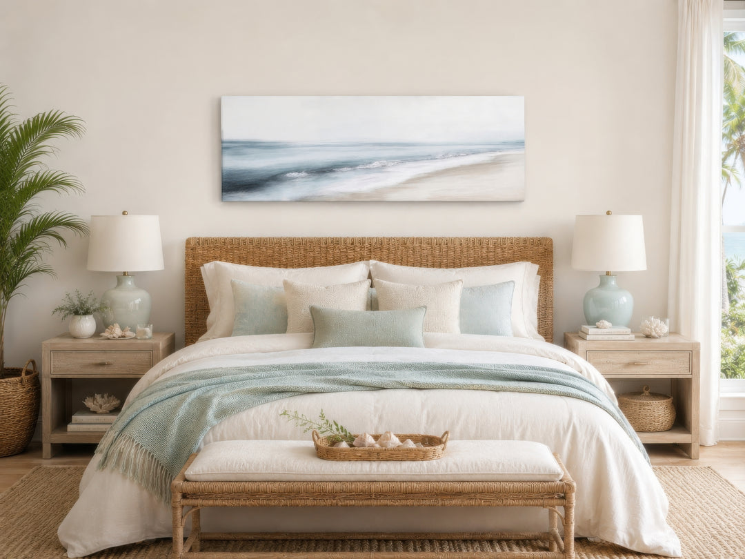 Minimalist panoramic watercolor painting of a gray and blue ocean beach above a coastal bed.