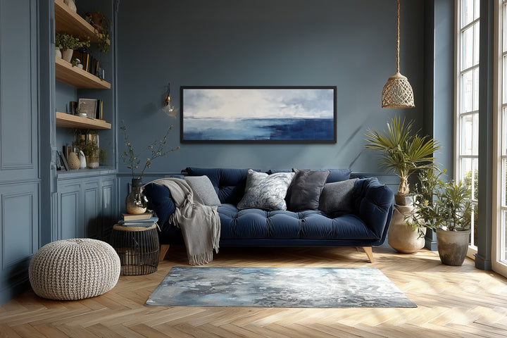 Minimalist panoramic framed canvas wall art featuring a navy blue and grey ocean horizon.