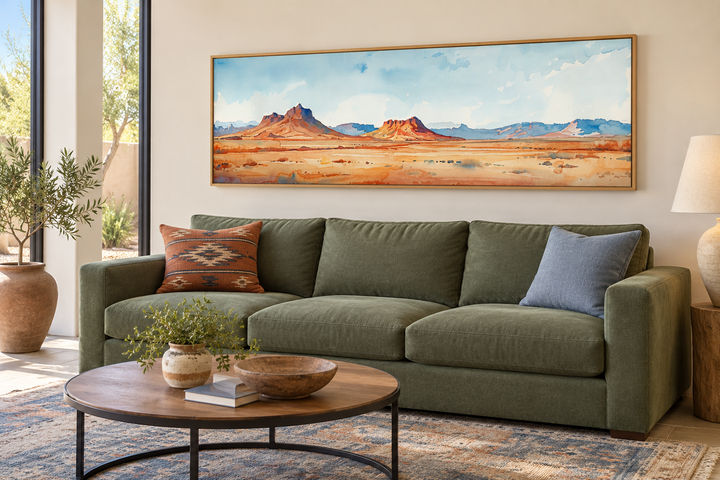 Arizona desert landscape minimalist horizontal framed canvas wall art above a green sofa.