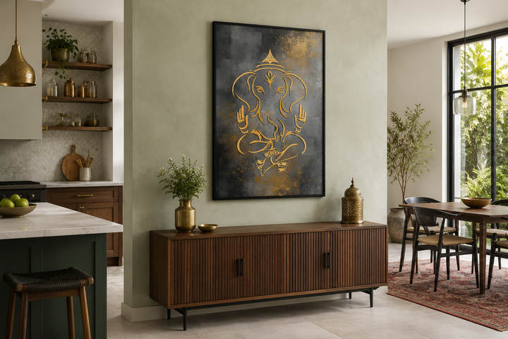 Minimalist gold Lord Ganesha line art on a dark gray framed canvas above a wooden sideboard.