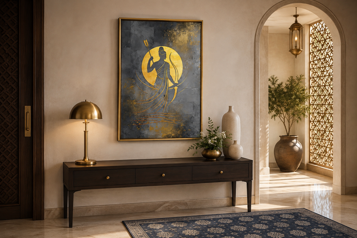 Minimalist Lord Rama framed canvas wall art in gold and silver tones above a dark wood console table.