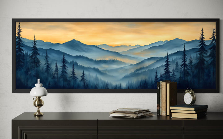 Misty mountain forest sunset long horizontal canvas wall art displayed above a dark console table.