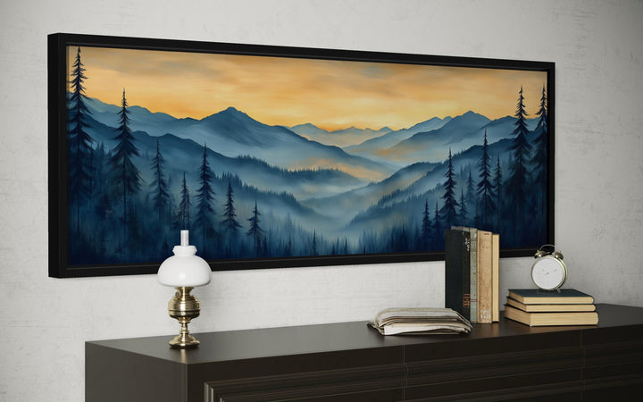 Misty mountain forest sunset long horizontal canvas wall art displayed above a dark wood dresser.