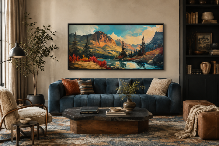 Modern abstract mountain lake sunset in autumn framed canvas wall art above a blue sofa.