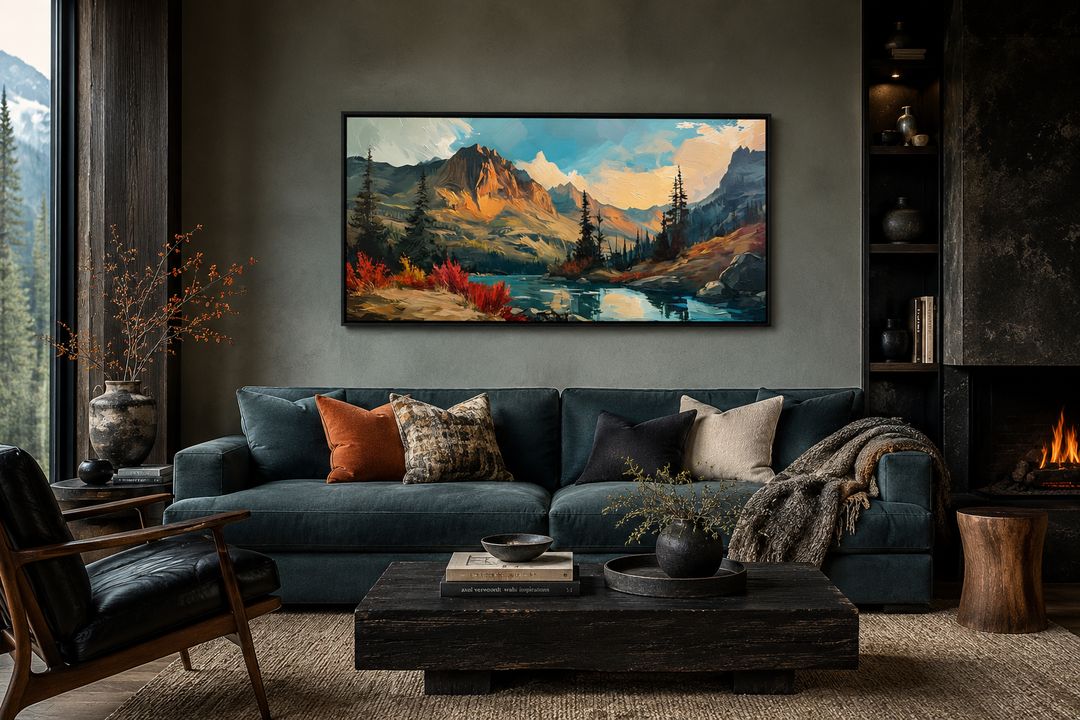 Modern abstract mountain lake sunset in autumn framed canvas wall art above a dark blue sofa.
