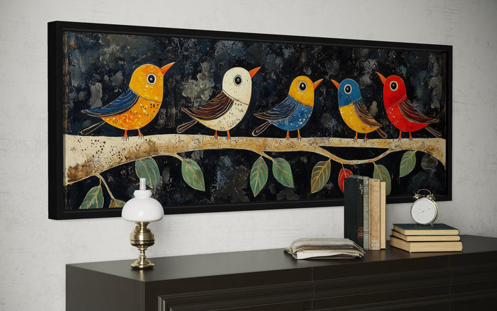Modern folk style long narrow canvas wall art featuring five colorful birds on a branch.