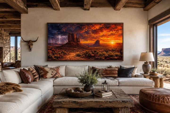 Monument Valley Southwestern wall art featuring a dramatic sunset with lightning over red buttes.