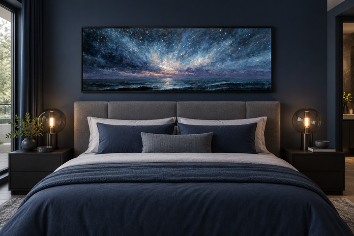 Panoramic navy and purple seascape painting above a bed in a modern dark-toned bedroom.