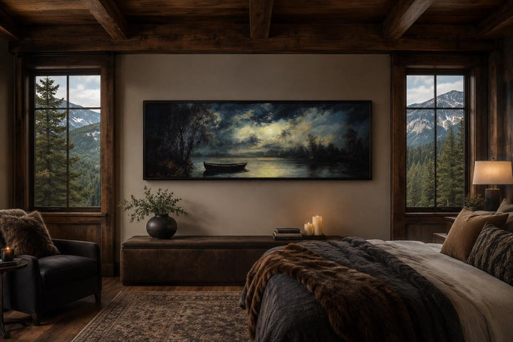 Moonlit rowboat and lake landscape long narrow canvas wall art hanging in a rustic cabin bedroom.