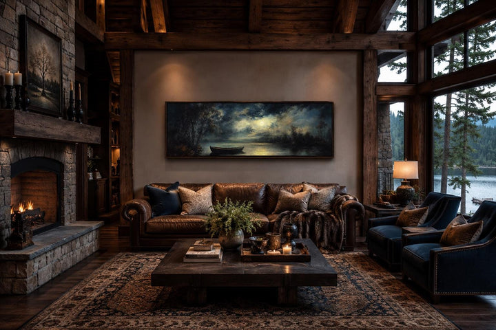 Long narrow canvas wall art of a moonlit rowboat on a still lake, hanging in a rustic cabin room.