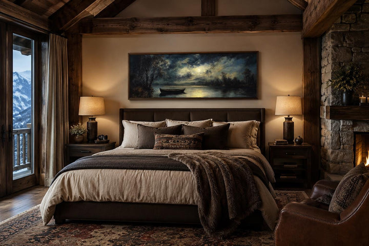 Moonlit rowboat and lake landscape long narrow canvas wall art above a bed in a rustic cabin.