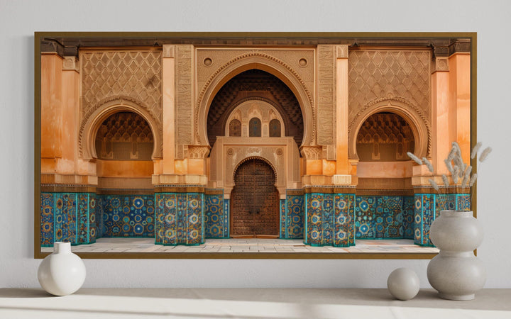 Moorish Architecture Moroccan Framed Canvas Wall Art featuring ornate arches and blue tilework.