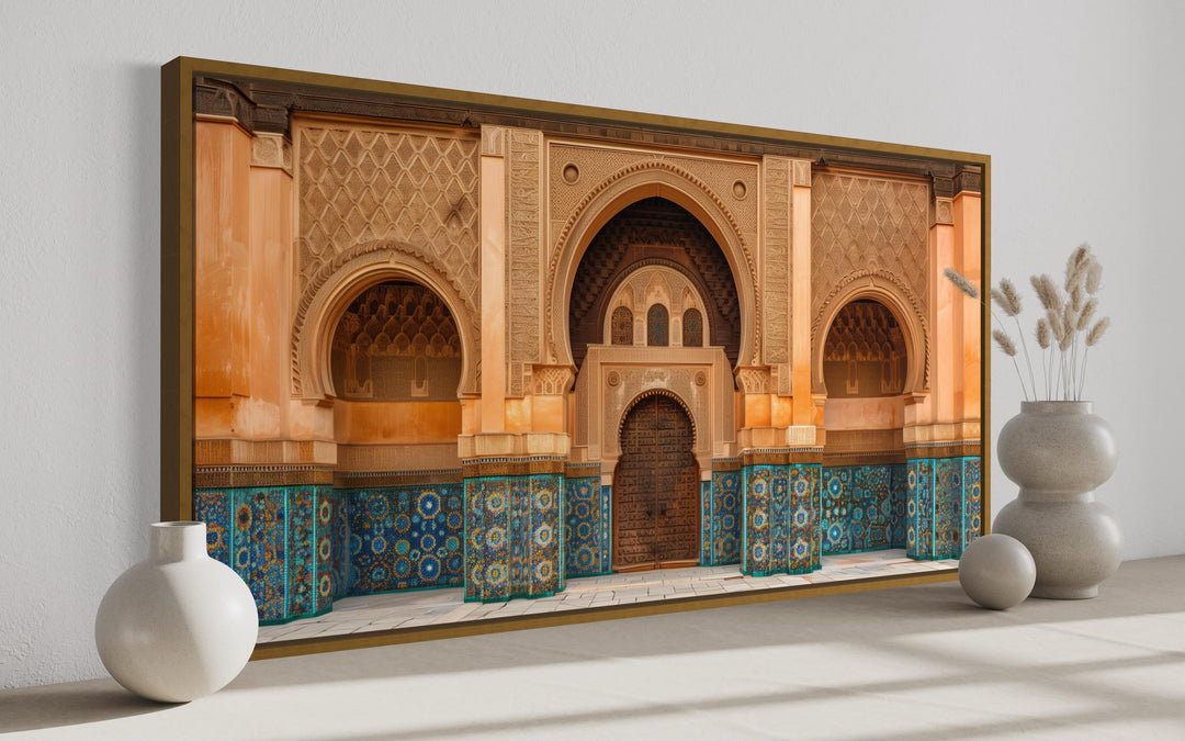 Moorish Architecture Moroccan Framed Canvas Wall Art with arched doorways and blue tilework.