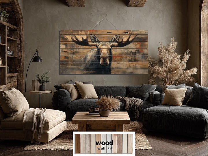 Large horizontal wood wall art featuring a rustic moose portrait on natural timber planks.