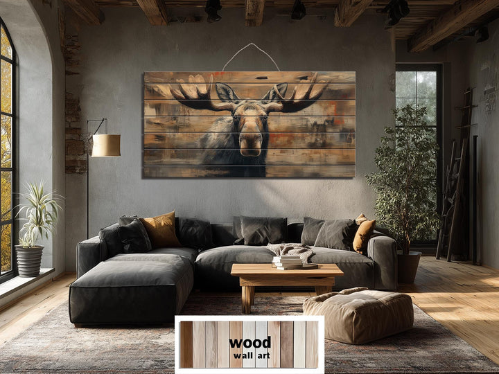 Large horizontal wood wall art featuring a realistic moose portrait for cabin or lodge decor.