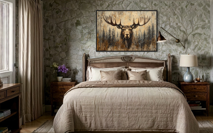 Moose Portrait On Wood Rustic Framed Canvas Wall Art hanging above a bed in a cabin-style bedroom.