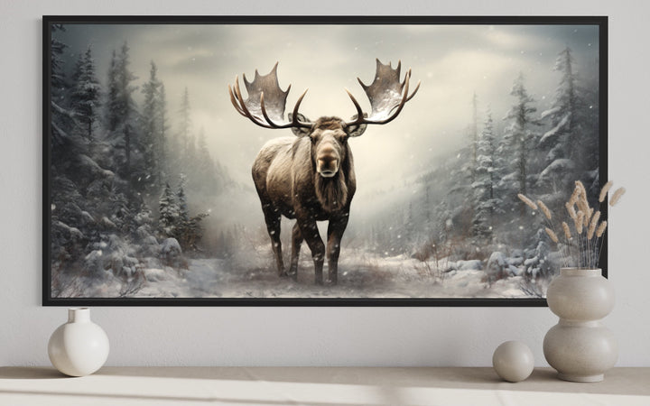 Framed canvas print of a majestic moose in a foggy, snow-covered winter forest.