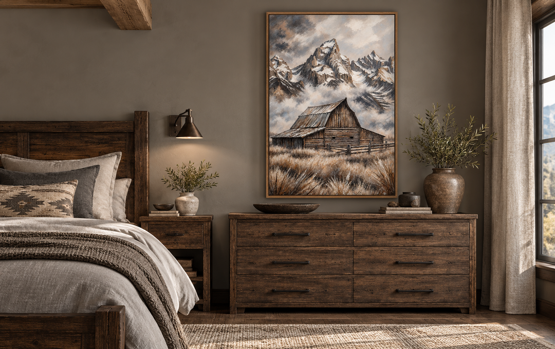 Moulton Barn in Grand Teton framed canvas wall art above a rustic wooden dresser in a bedroom.